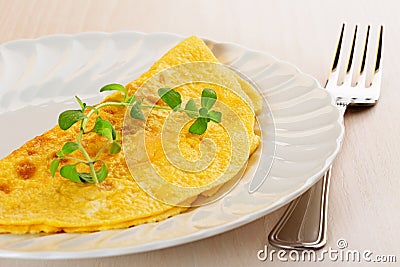 Omelette garnished with marjoram Stock Photo