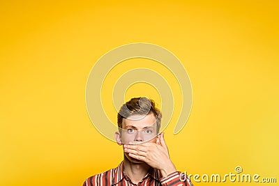 Omg man cover mouth hand amazing astonishing Stock Photo