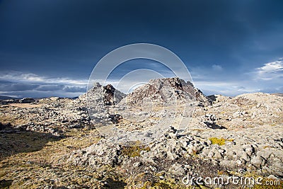 Ominous sky over an unearthly landscape in Iceland Stock Photo