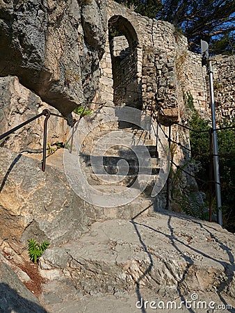 Omis, Croatia - July 23, 2021: Stairs leading to the Mirabela fortress in the historic city of Omis Editorial Stock Photo