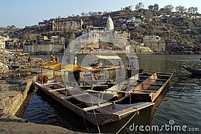 Omkareshwar ghat and river Narmada and temple of Shiva Editorial Stock Photo