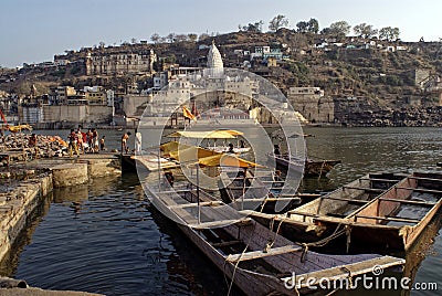 Omkareshwar ghat and river Narmada and temple of Shiva Editorial Stock Photo