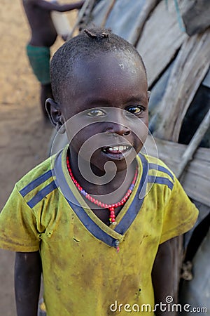 Close up portraits of Dassanech Tribe Children with Traditional Bright Necklace in the Local Village Editorial Stock Photo