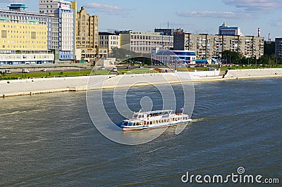 OMSK, RUSSIA - August 16, 2009: Irtysh river with sailing ship along embankment Editorial Stock Photo