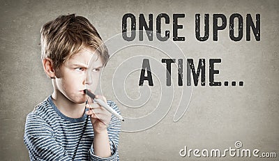 Once upon a time, story telling, Boy on grunge background Stock Photo