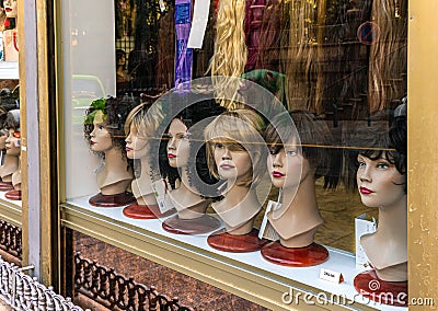 Oncological wigs shop in the city center - Hairdresserd supply Stock Photo