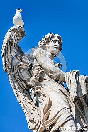 One of the angel statues on the Angel bridge over the Tiber in Rome. Italy Stock Photo