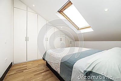 One-bedroom vacation rental apartment with built-in wooden wardrobe Stock Photo