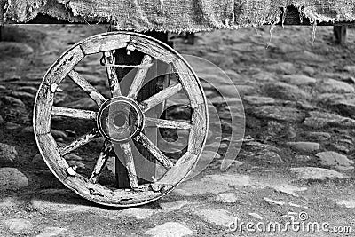 One big old wheel for the animal-drawn vehicle or for the cart Stock Photo