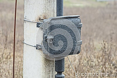 One black old iron square box for electrical wires Stock Photo