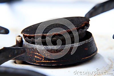 A one black rust gas burner on white cooker for warm up food for eating Stock Photo