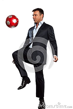 One business man playing juggling soccer ball Stock Photo