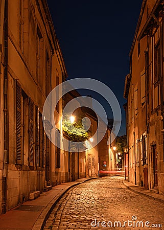 One of the charming streets of Beaune by night, France Stock Photo