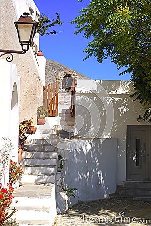 One of the charms of Mykonos, Greek island in the heart of the cyclades, are its narrow streets Stock Photo