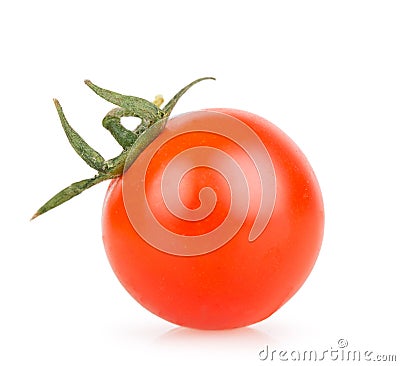 One cherry tomato on a white background Stock Photo