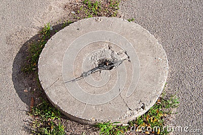 One concrete manhole Stock Photo