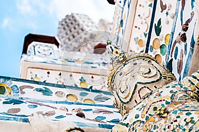 One corner of the giant temple of Arun that is raising the base of Phra Prang Wat Arun,Bangkok Thailand. Stock Photo