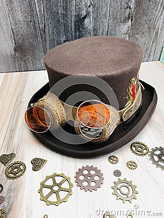 dark brown steampunk hat with goggles, gears, shades, for steampunk groom Stock Photo