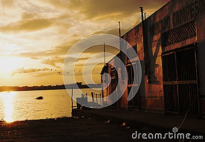 Sunset near the sea on a sad street Stock Photo