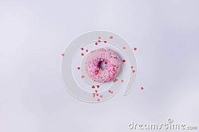 One Donut With Icing on Pastel Pink Blue Background Sweet Tasty Donuts Copy Space Top View Flat Lay Stock Photo