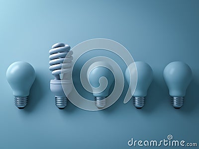 One eco energy saving light bulb different and stand out from old incandescent lightbulbs on cyan Stock Photo