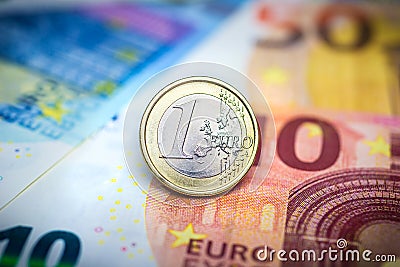 One Euro Coin on banknotes Stock Photo