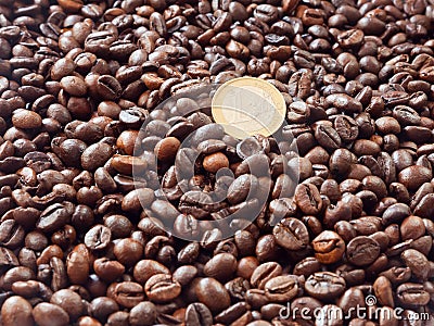 One euro coin closeup on coffee beans background Stock Photo