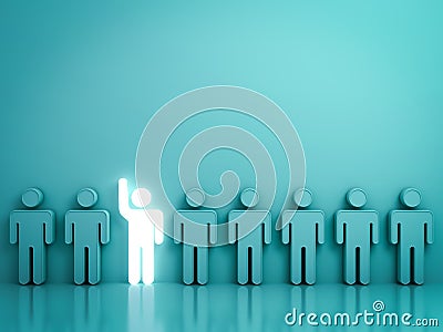 One glowing light man raising his hand among other people on green Stock Photo