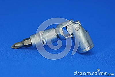 One gray metal adapter with a screwdriver Stock Photo