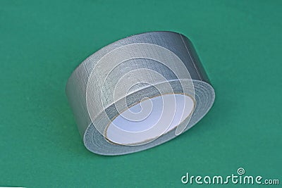 One gray round roll of reinforced tape Stock Photo