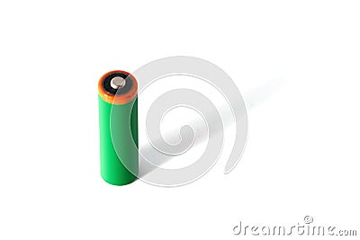 One green battery with a long shadow Stock Photo