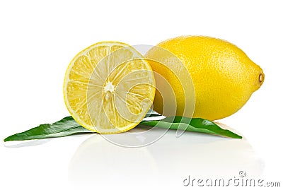 One and a half ripe lemon with green leaves Stock Photo