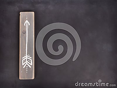 One hand painted arrow on a wooden plank Stock Photo
