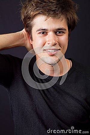 One happy handsome man with nice hair Stock Photo