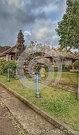 one of the historic buildings that has stood firmly in the village of Panglipuran, Bali Stock Photo