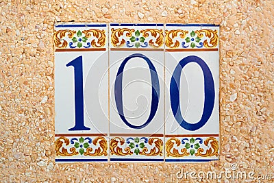 100 (one hundred) tile numbered Stock Photo