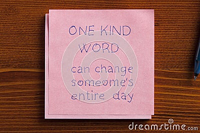 One kind word written on a note Stock Photo