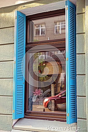 One long window with brown on a table lamp behind glass Stock Photo