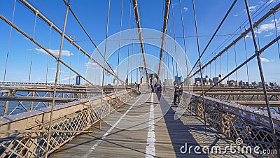 One of the main attractions in New York - famous Brooklyn Bridge- MANHATTAN - NEW YORK - APRIL 1, 2017 Editorial Stock Photo