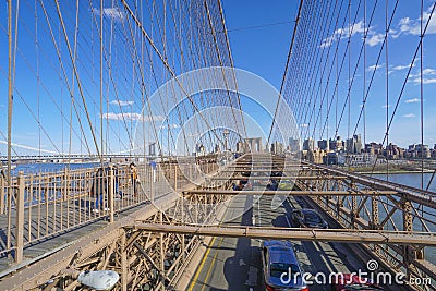 One of the main attractions in New York - famous Brooklyn Bridge- MANHATTAN - NEW YORK - APRIL 1, 2017 Editorial Stock Photo