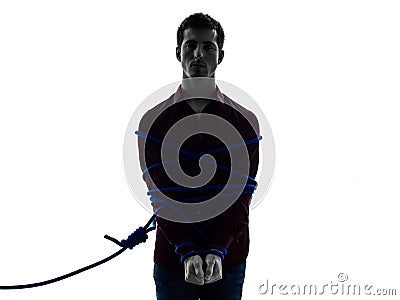 One man trapped catched lasso prisoner silhouette Stock Photo