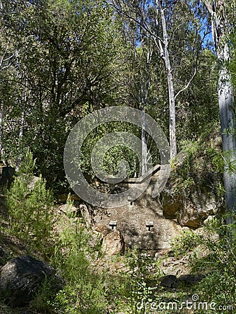 One of the many Stone built culverts along the Sendero el Santo Trail which helps control flash flooding in high rainfall periods. Stock Photo