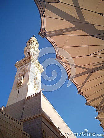 One of minarets of Al-Masjid an-Nabawi in Medina Editorial Stock Photo