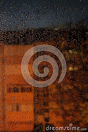 One more rainy day. Night. Raindrops on the window glass. Season specific. Drop dropped drops Beautiful Wonderful background Stock Photo