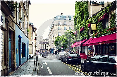 One of the most beautiful Parisian streets in Marais district, rue Rosiers Editorial Stock Photo