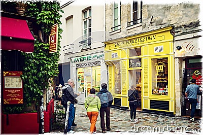 One of the most beautiful Parisian streets in Marais district, rue Rosiers Editorial Stock Photo
