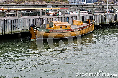 One old boat of wood in the harbour Stock Photo