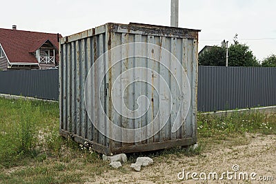 One old gray closed iron container Stock Photo