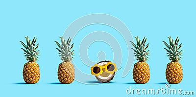 One out unique coconut with many pineapples Stock Photo