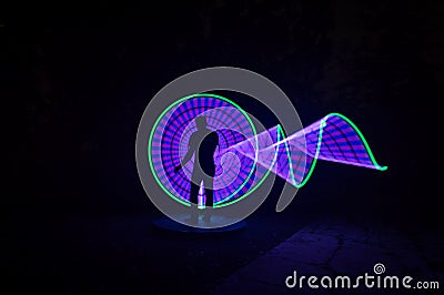 People with beautiful light painting artwork Stock Photo